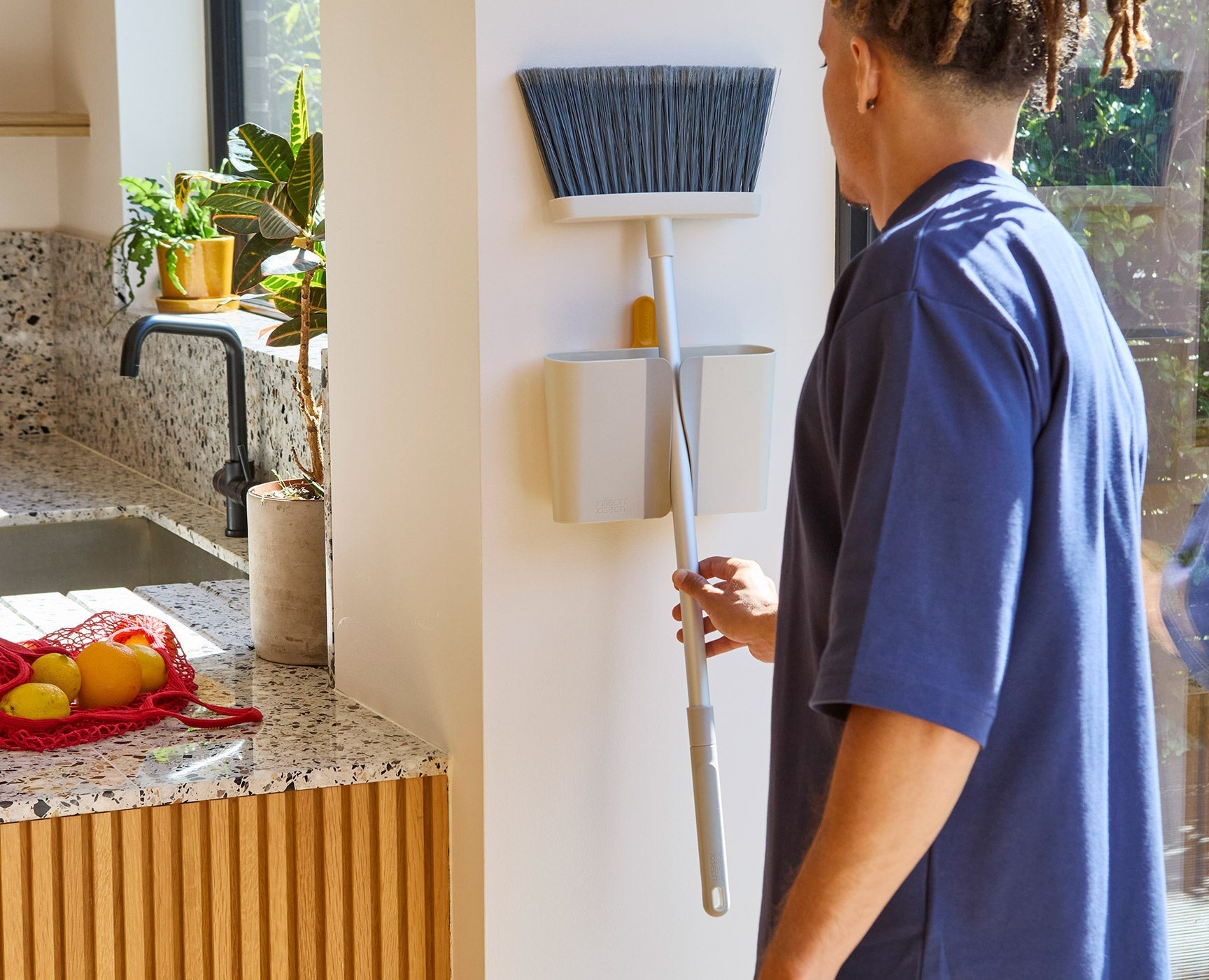 CleanTech™ Wall-Mounted Broom