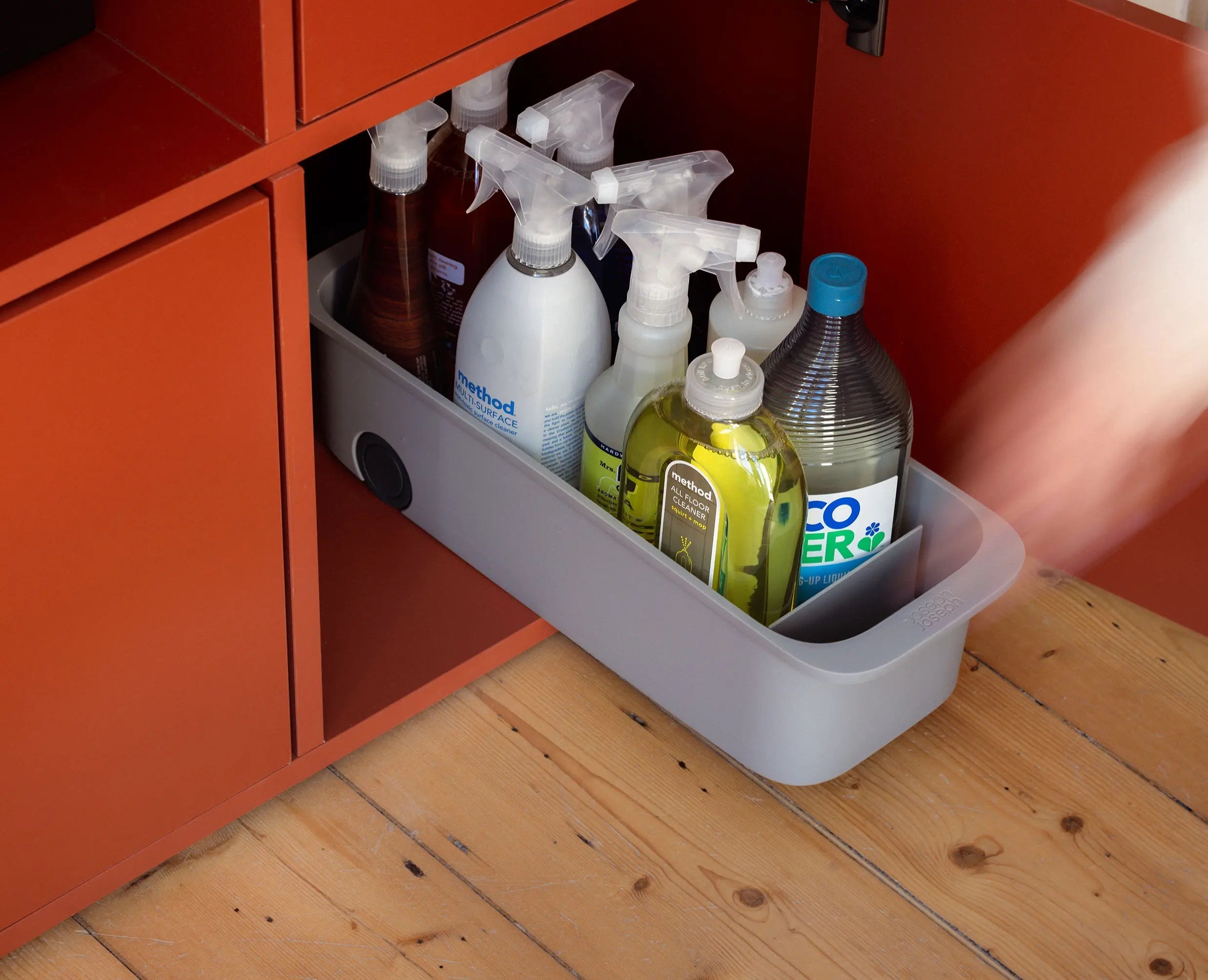 Under the sink storage outlet caddy